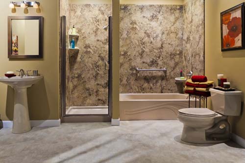 Tan walled bathroom with toilet, shower, and bath.